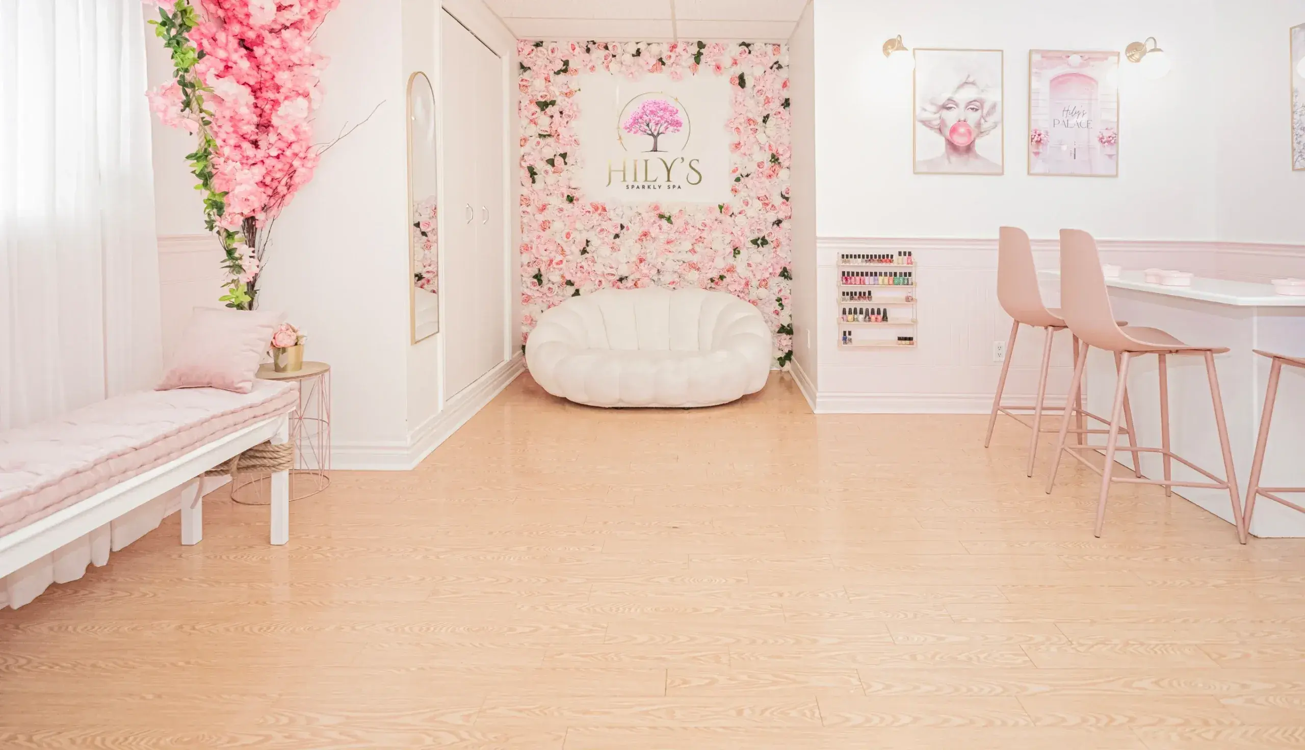 Inside Hily's Sparkly Spa — the blossom wall and pink manicure bar